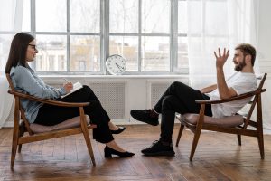 a-woman-talking-to-a-man