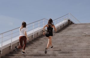 A person running or biking outdoors