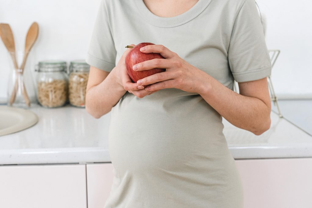 pregnant-woman-eating-a-healthy-meal