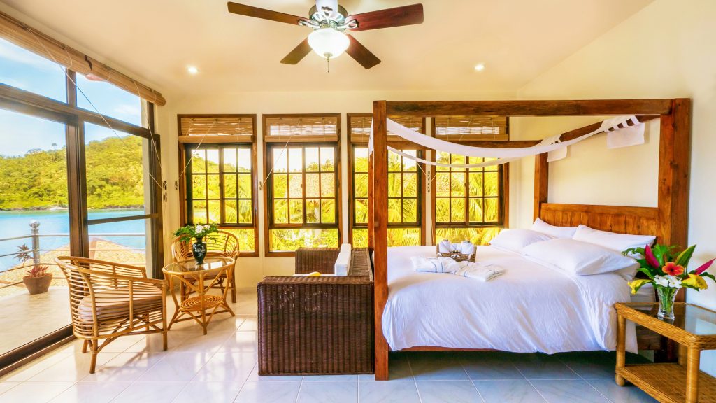 Light and airy tropical resort luxurious bedroom