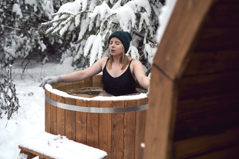 caucasian-woman-during-the-winter-bath-in-tube-out
