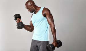 african-fitness-model-working-out-with-dumbbells-