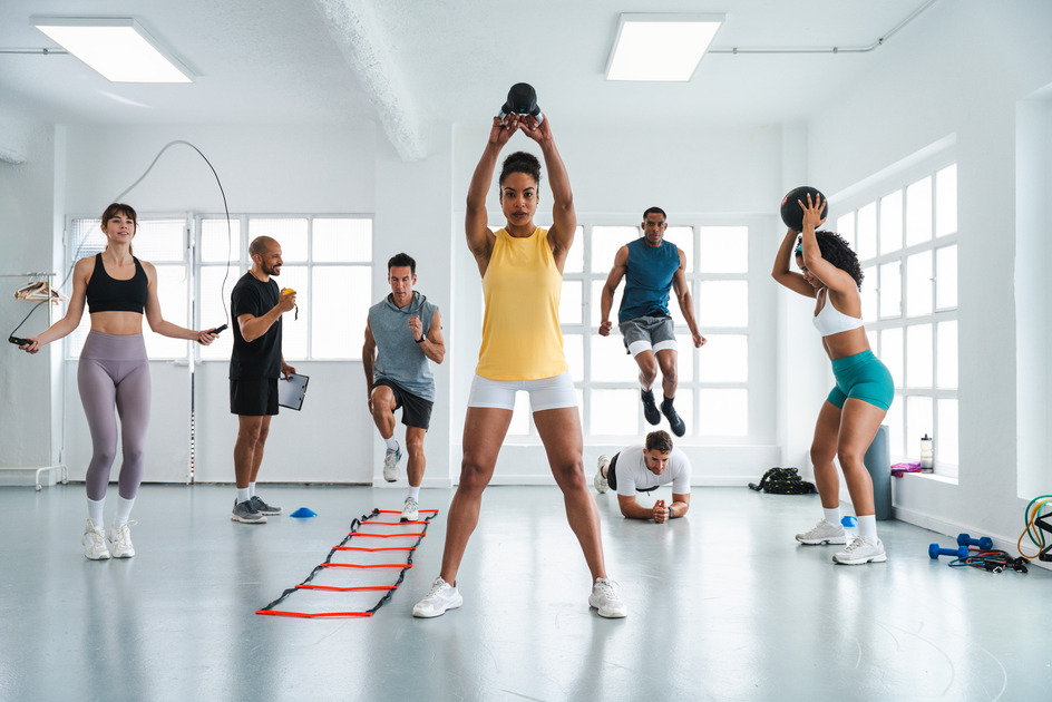 athletes-doing-functional-training-workout-at-gym