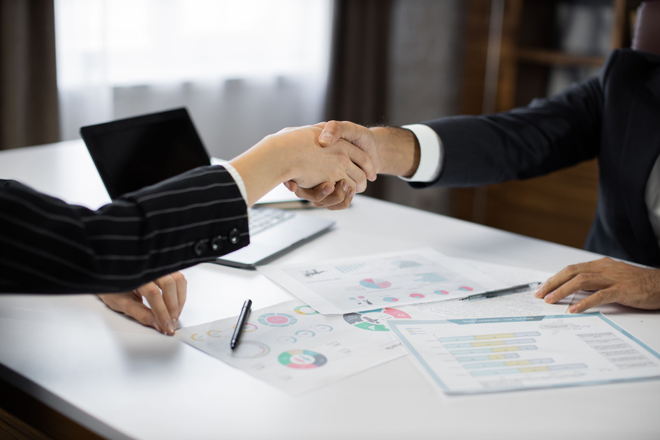 close-up-of-business-partners-handshake-deal-come