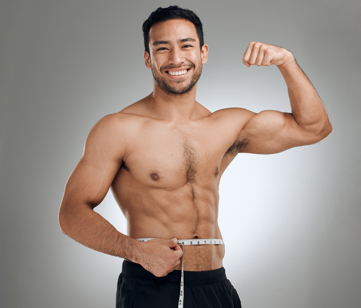 studio-shot-of-a-man-flexing-his-muscles-while-mea-2025-04-06-09-01-09-utc-1.jpg
