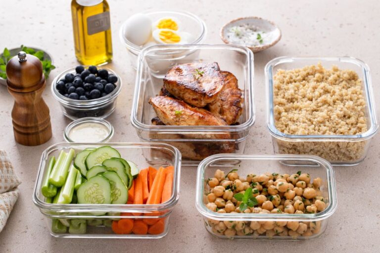 High-protein-healthy-lunch-meal-prep-in-containers-with-chicken-quinoa-chickpeas-vegetables-eggs
