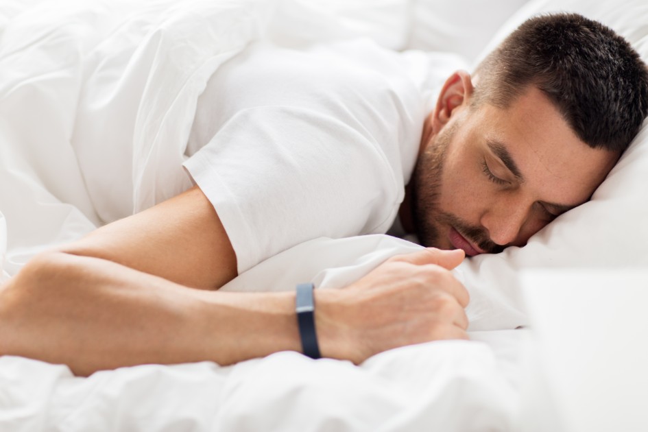 People, Bedtime And Rest Concept - Man With Smartwatch Sleeping In Bed
