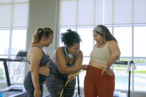 Plus-size-women-workout-at-fitness-center