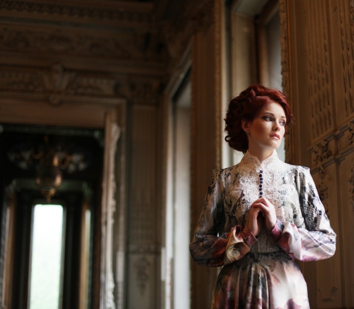 young-beautiful-woman-standing-in-the-palace-room-