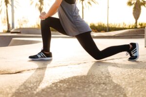 Young-sports-woman-make-stretching-exercises