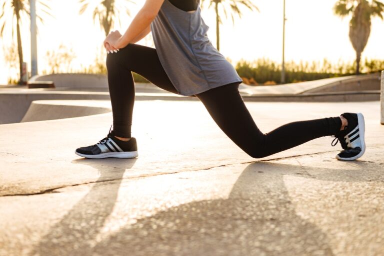 Young-sports-woman-make-stretching-exercises