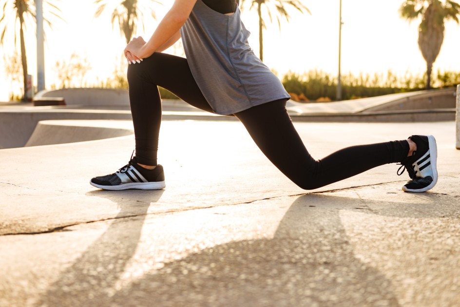 Young-sports-woman-make-stretching-exercises