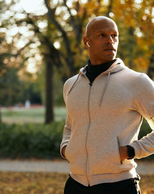 Man Enjoying Sunny Outdoor Workout in Autumn Park