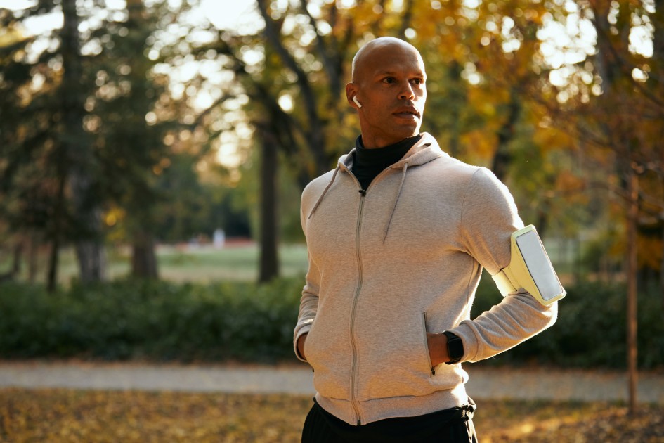 Man Enjoying Sunny Outdoor Workout in Autumn Park