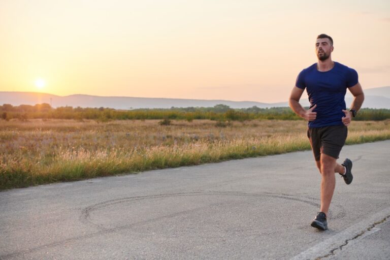 Man Running at Sunset in Rural Area