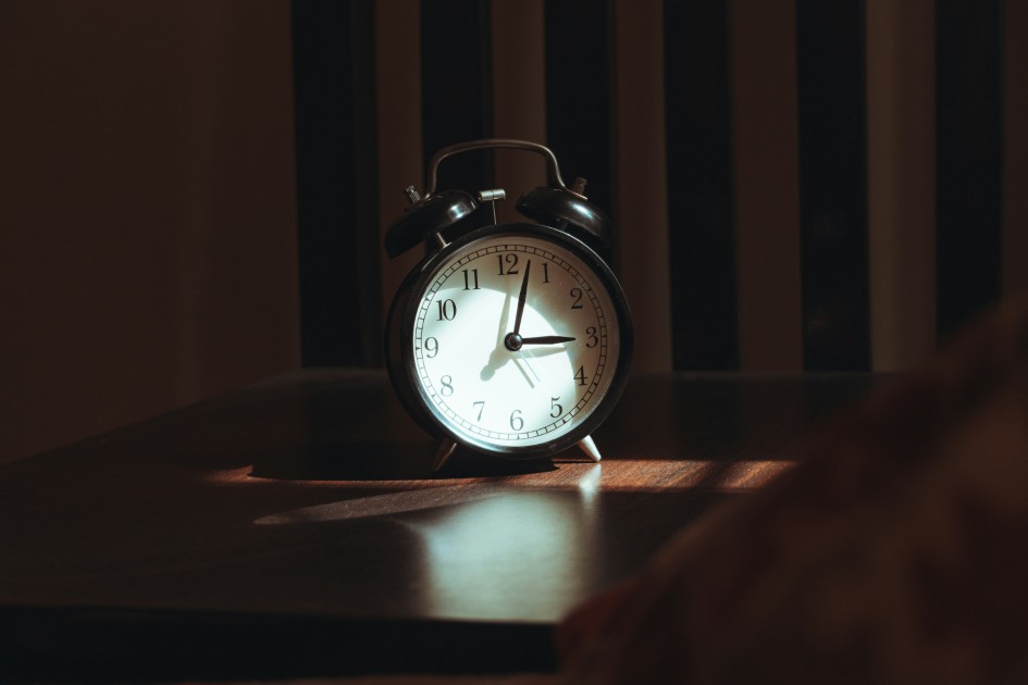 an alarm clock at dusk.